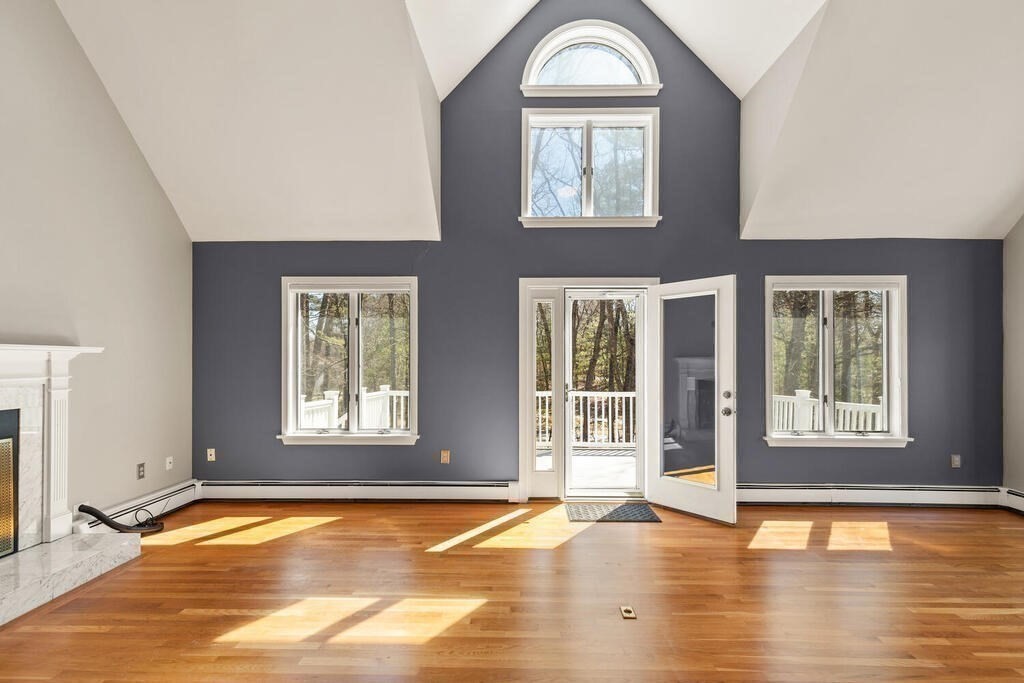 18 Appleton Lane Boxford, MA 01921 - Photo 28 of 42 an empty room with wooden floor and a window