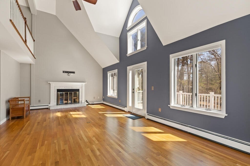 18 Appleton Lane Boxford, MA 01921 - Photo 29 of 42 a view of an empty room with a fireplace and a window