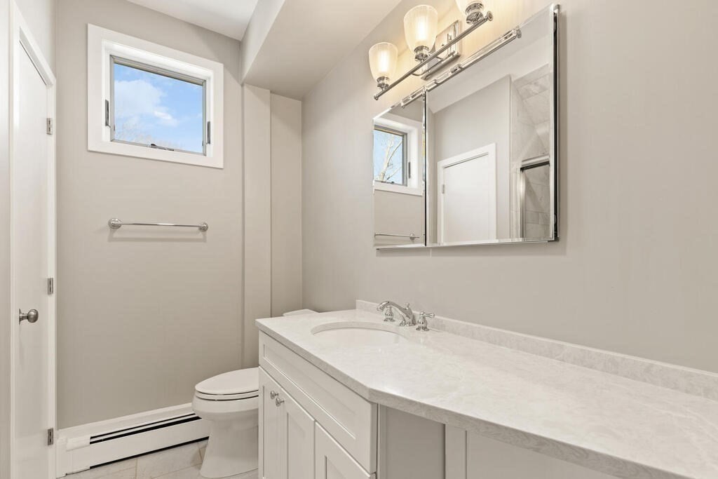 18 Appleton Lane Boxford, MA 01921 - Photo 35 of 42 a bathroom with a sink a toilet and shower