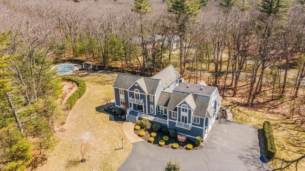 18 Appleton Lane Boxford, MA 01921 - Photo 41 of 42 a view of a house with large trees and covered with wooden fence