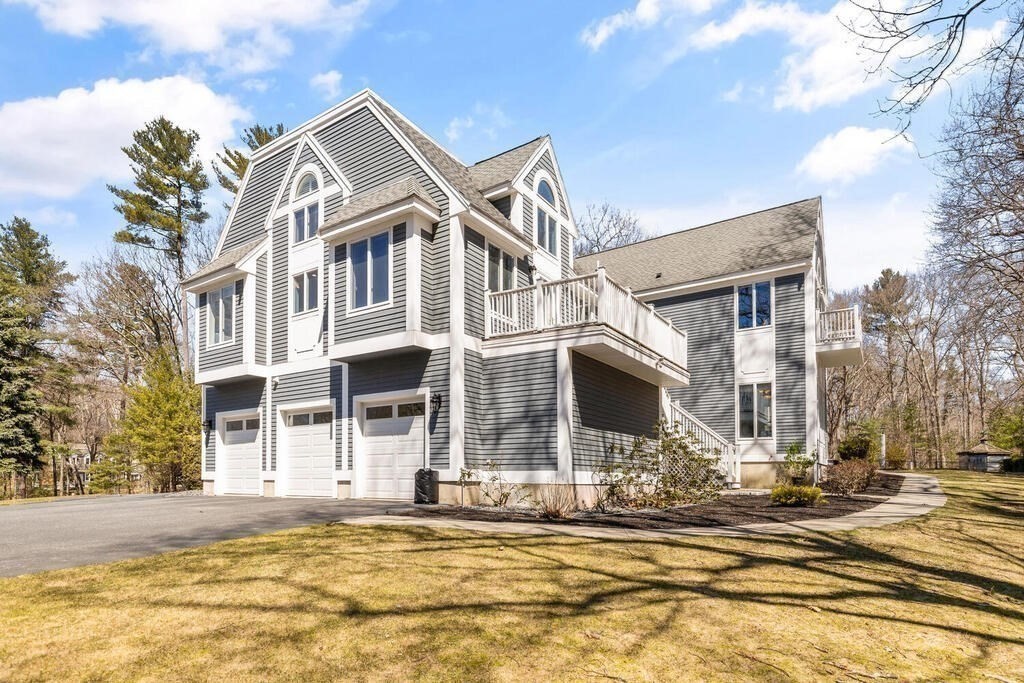 18 Appleton Lane Boxford, MA 01921 - Photo 5 of 42 a front view of a building with a yard
