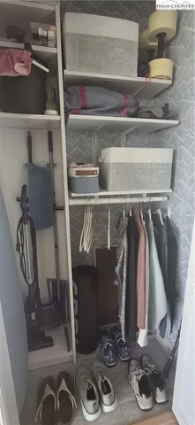 a view of a closet in a room
