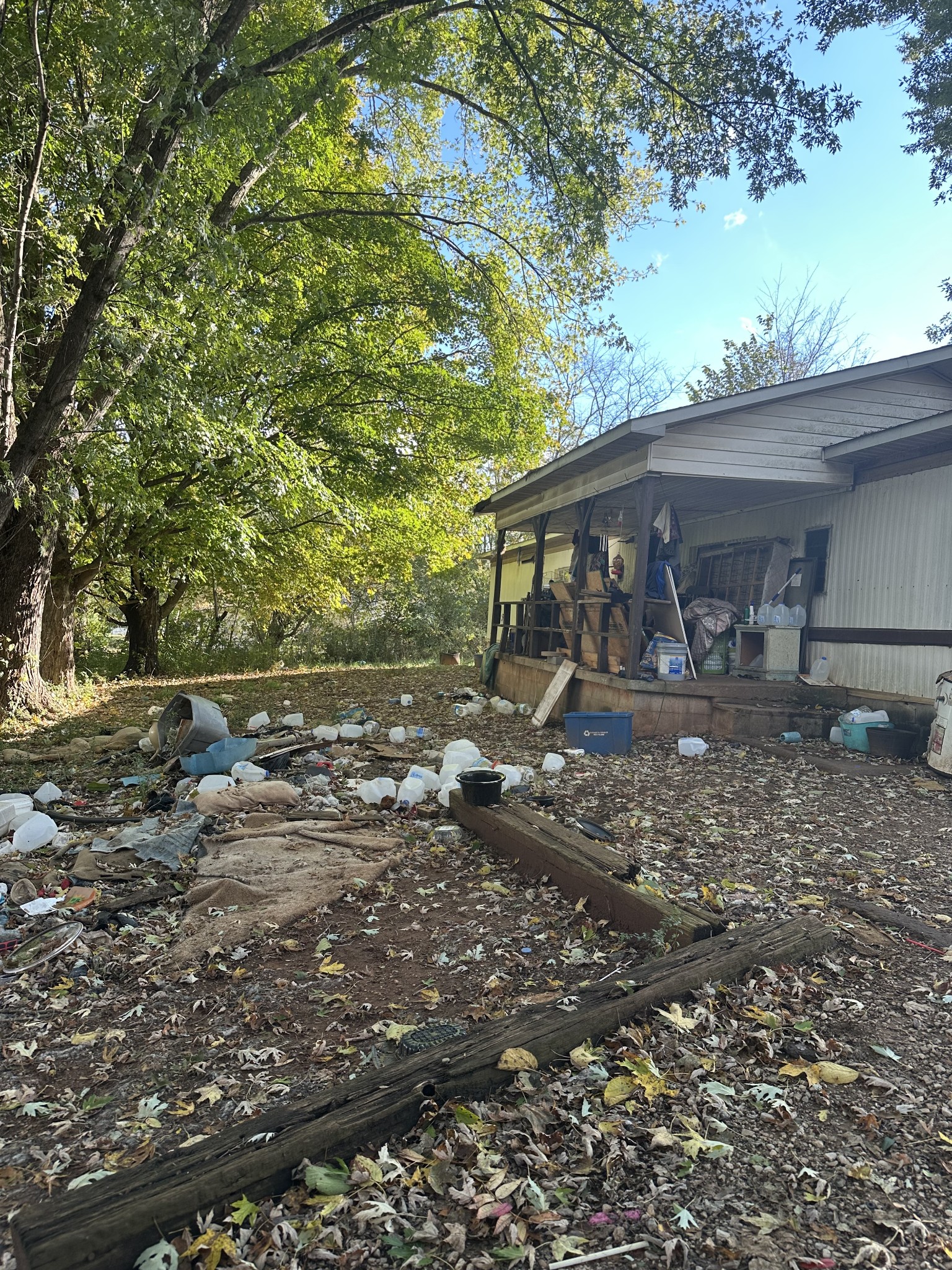 622 County House Road Livingston, TN 38570 - Photo 2 of 6 a backyard of a house with barbeque oven