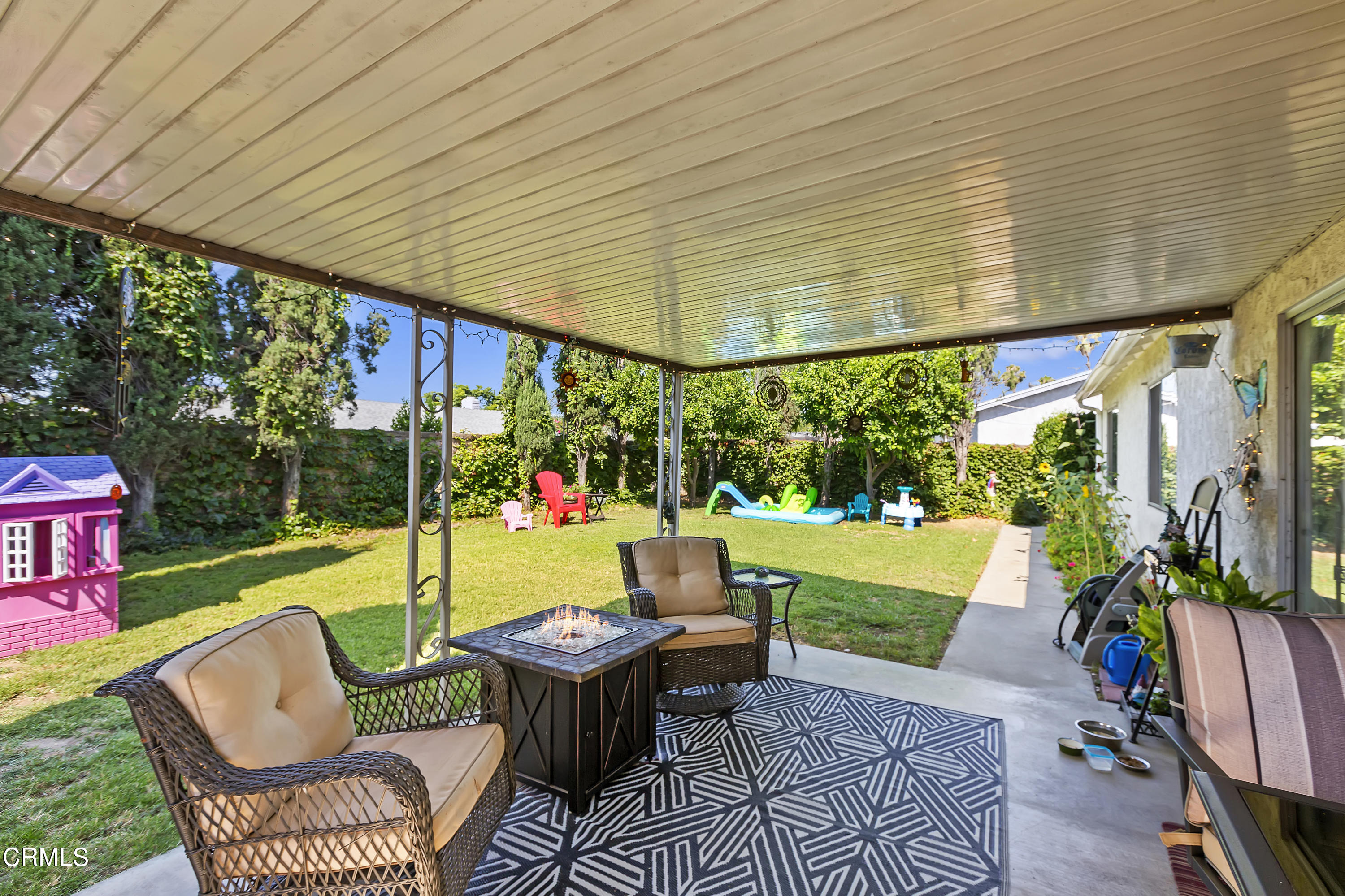 9245 Devon Street Rancho Cucamonga, CA 91730 - Photo 19 of 22 a patio with garden area and outdoor seating