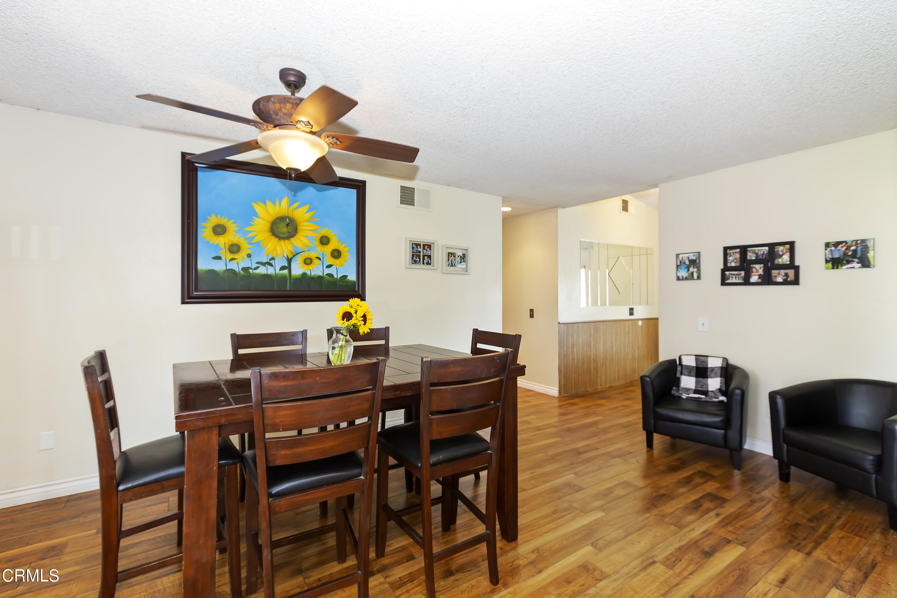 9245 Devon Street Rancho Cucamonga, CA 91730 - Photo 22 of 22 a view of a livingroom with furniture and wooden floor