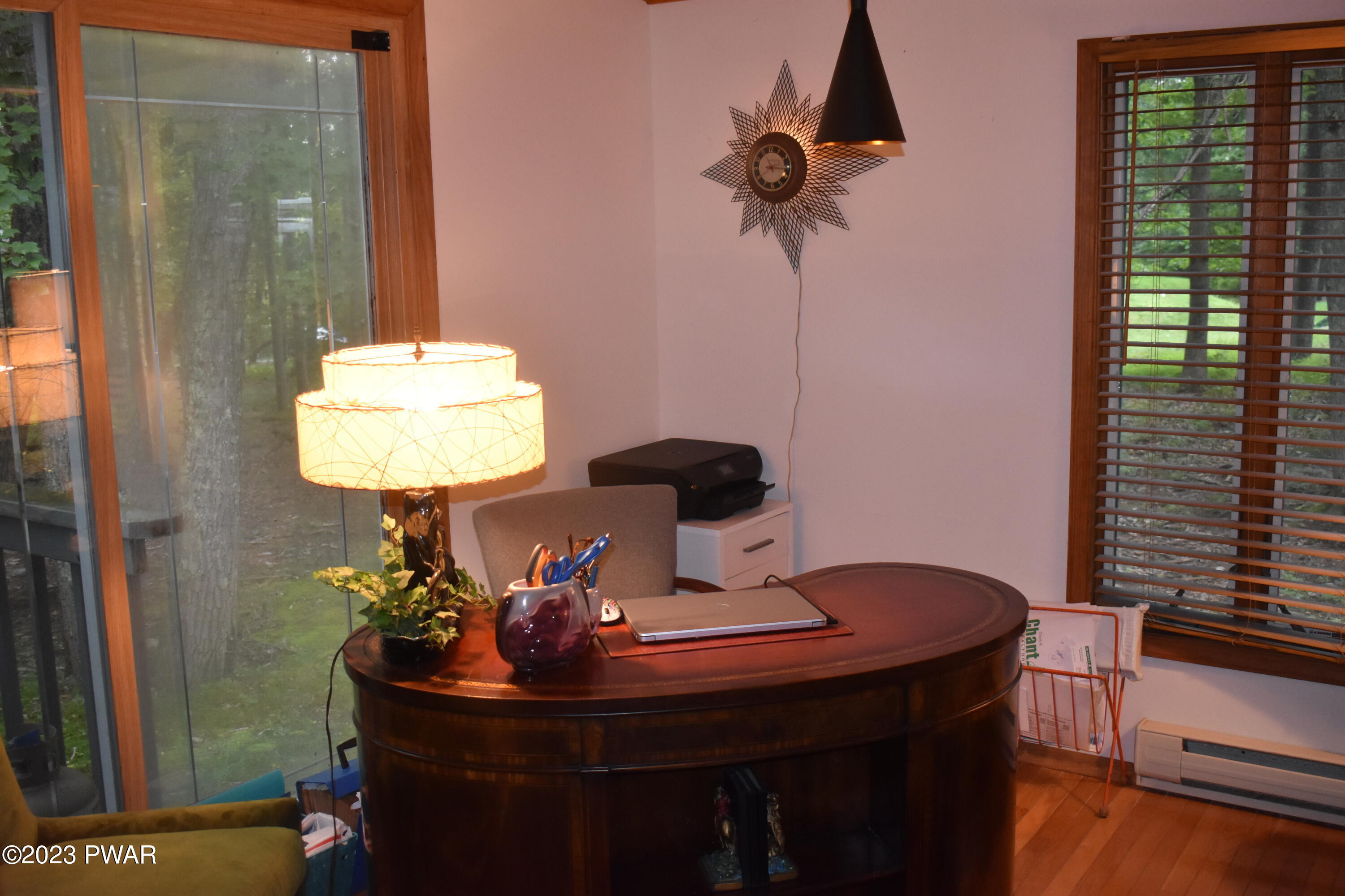 139 Rodeo Drive Hawley, PA 18428 - Photo 13 of 27 a room with furniture and wooden floor