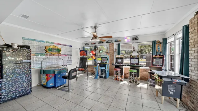 a view of hallway with wooden floor