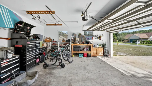 a view of a house with swimming pool and a yard