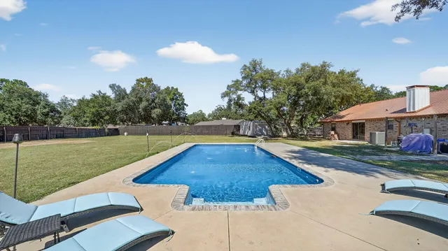 a view of a garden with an outdoor space