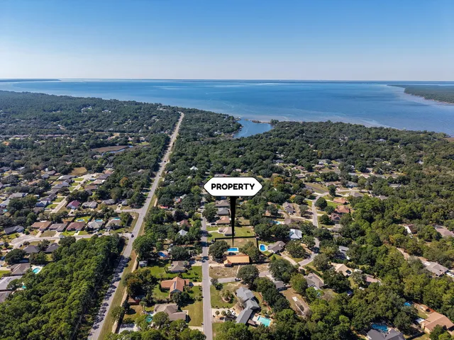an aerial view of residential building and green space