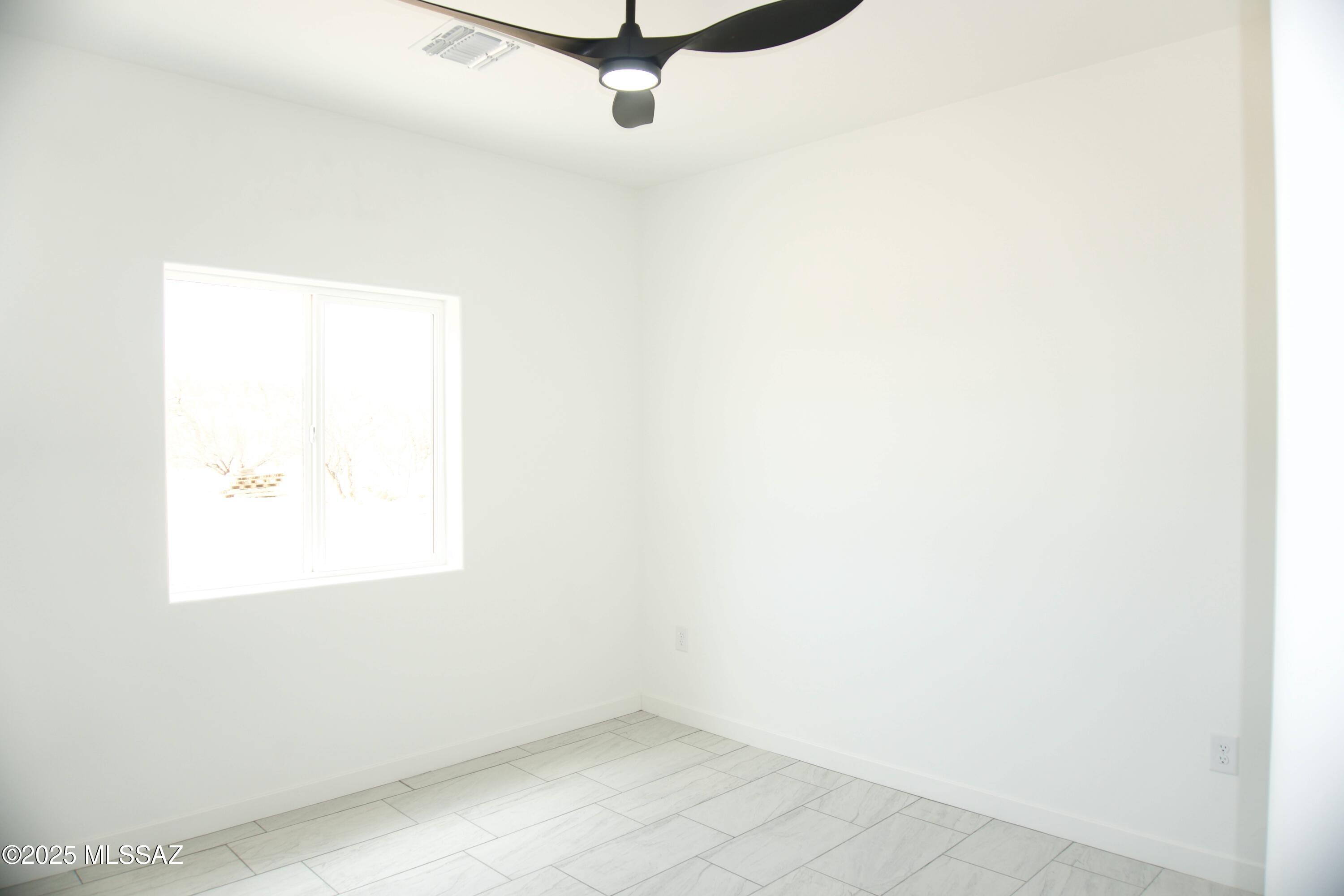 126 Alemania Court Rio Rico, AZ 85648 - Photo 26 of 31 a view of a small space with window in it