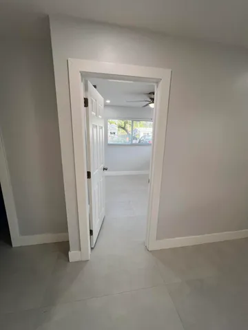 an empty room with a door