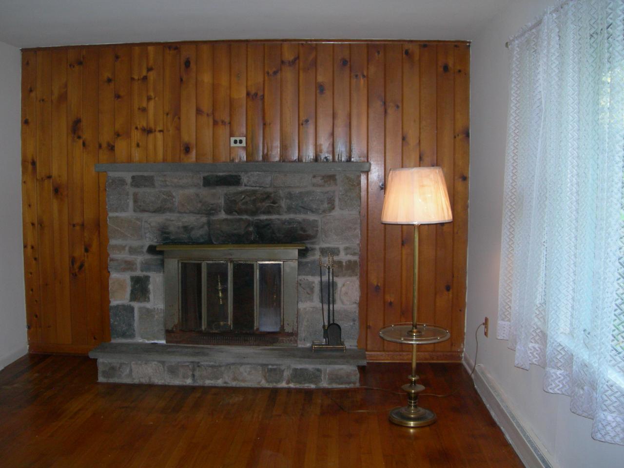 Lot 316 Red Run Road Pocono Summit, PA 18346 - Photo 2 of 11 a living room with a fireplace and a wooden floor