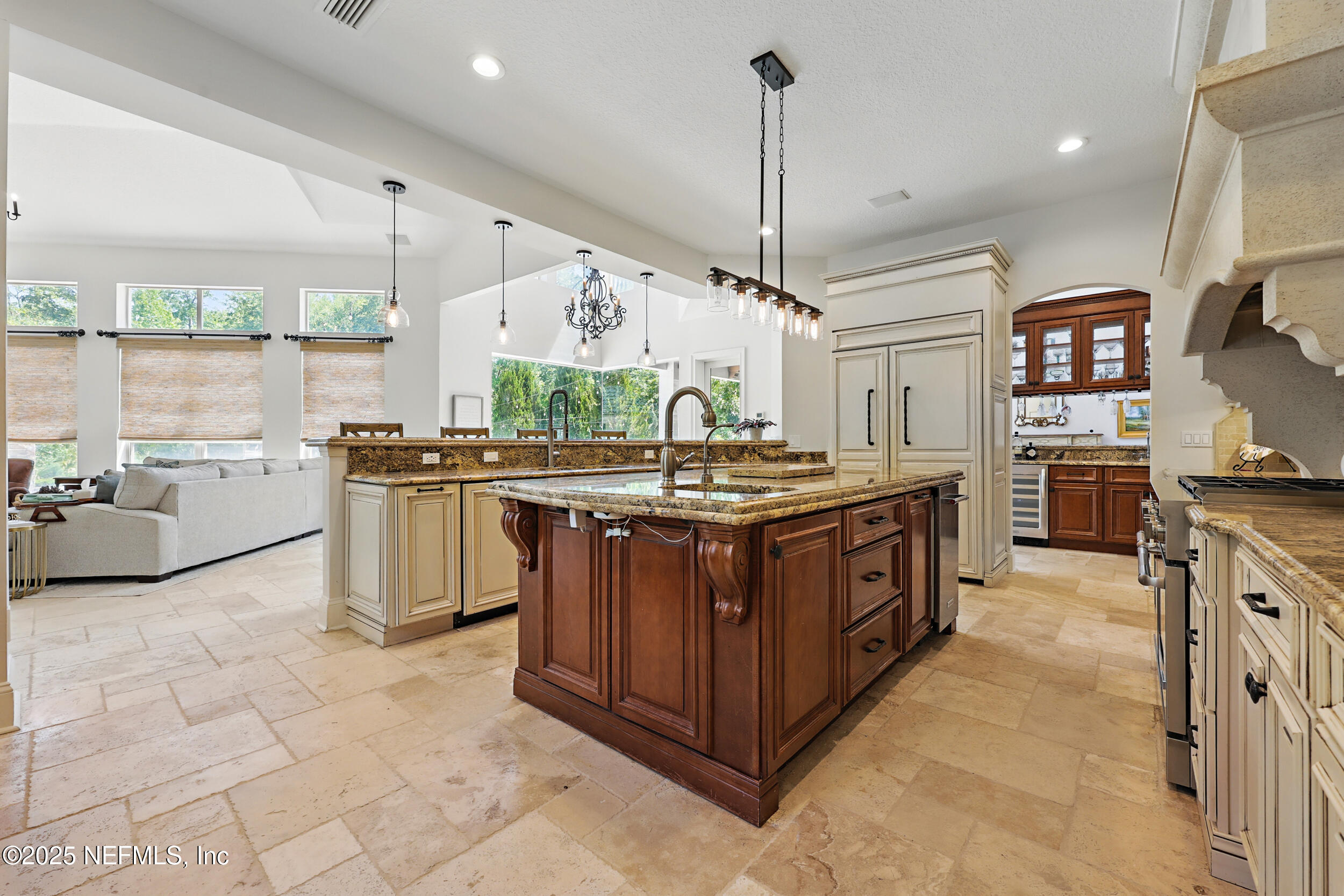 8007 Acorn Ridge Road Jacksonville, FL 32256 - Photo 15 of 76 a kitchen with stainless steel appliances granite countertop a stove a sink and a refrigerator
