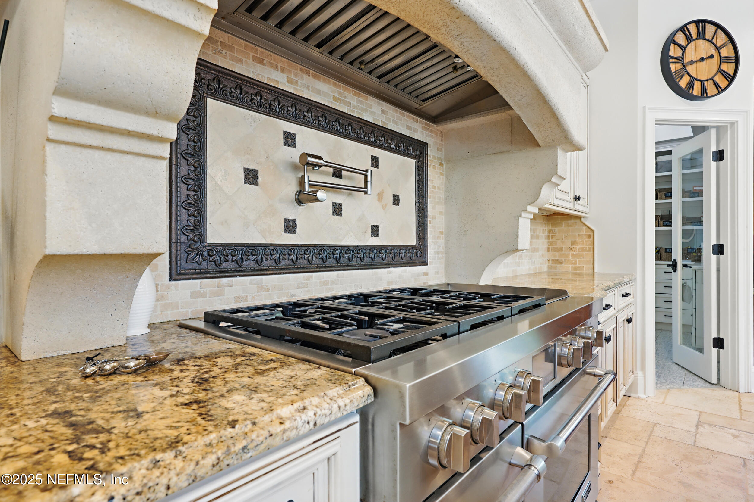 8007 Acorn Ridge Road Jacksonville, FL 32256 - Photo 17 of 76 a kitchen with a stove and a white refrigerator