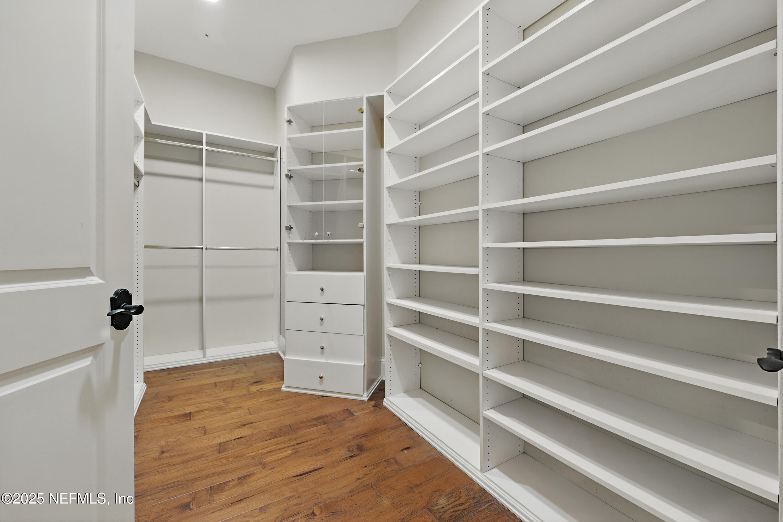 8007 Acorn Ridge Road Jacksonville, FL 32256 - Photo 29 of 76 a view of walk in closet with empty racks
