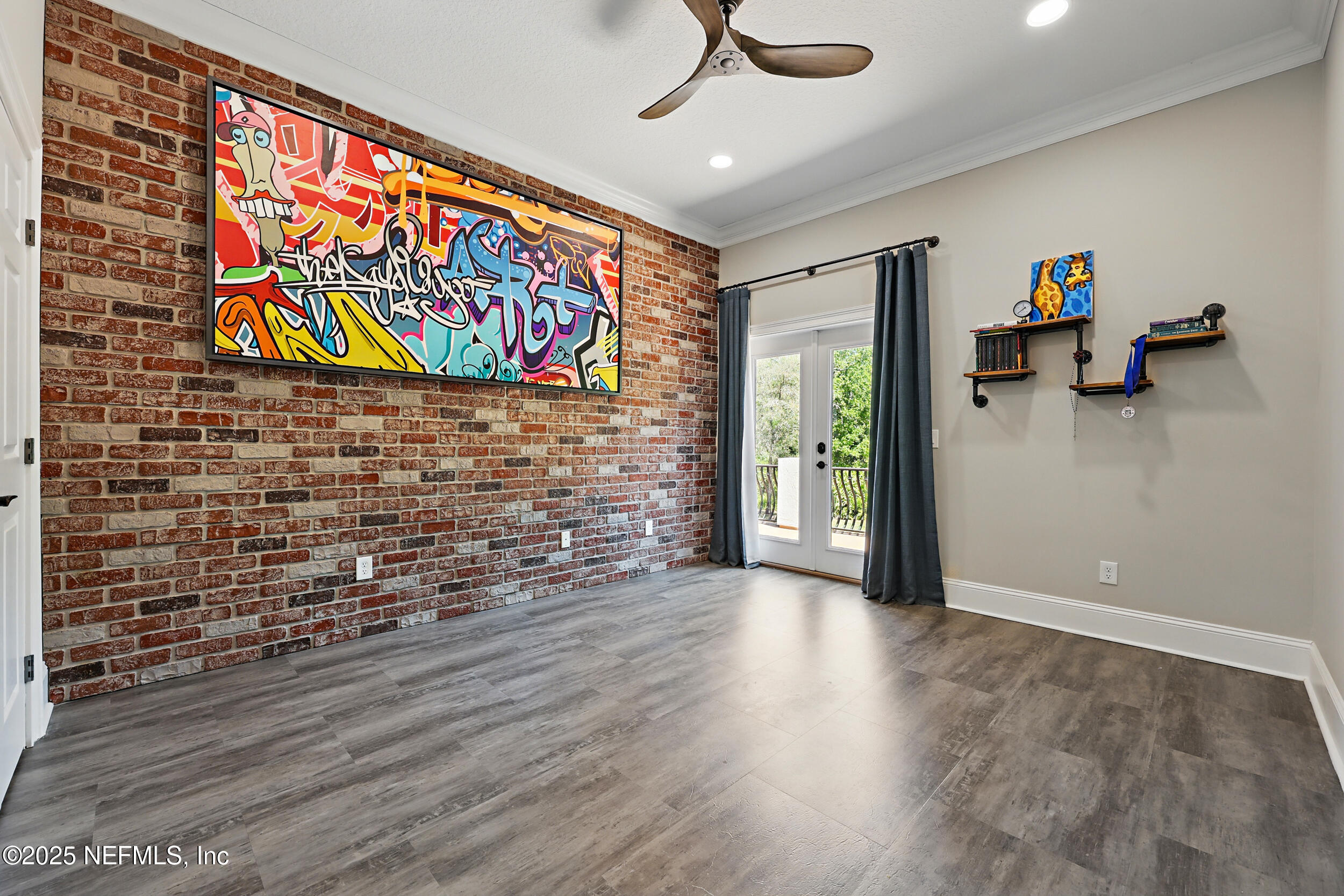 8007 Acorn Ridge Road Jacksonville, FL 32256 - Photo 42 of 76 a view of an empty room with window and hardwood floor