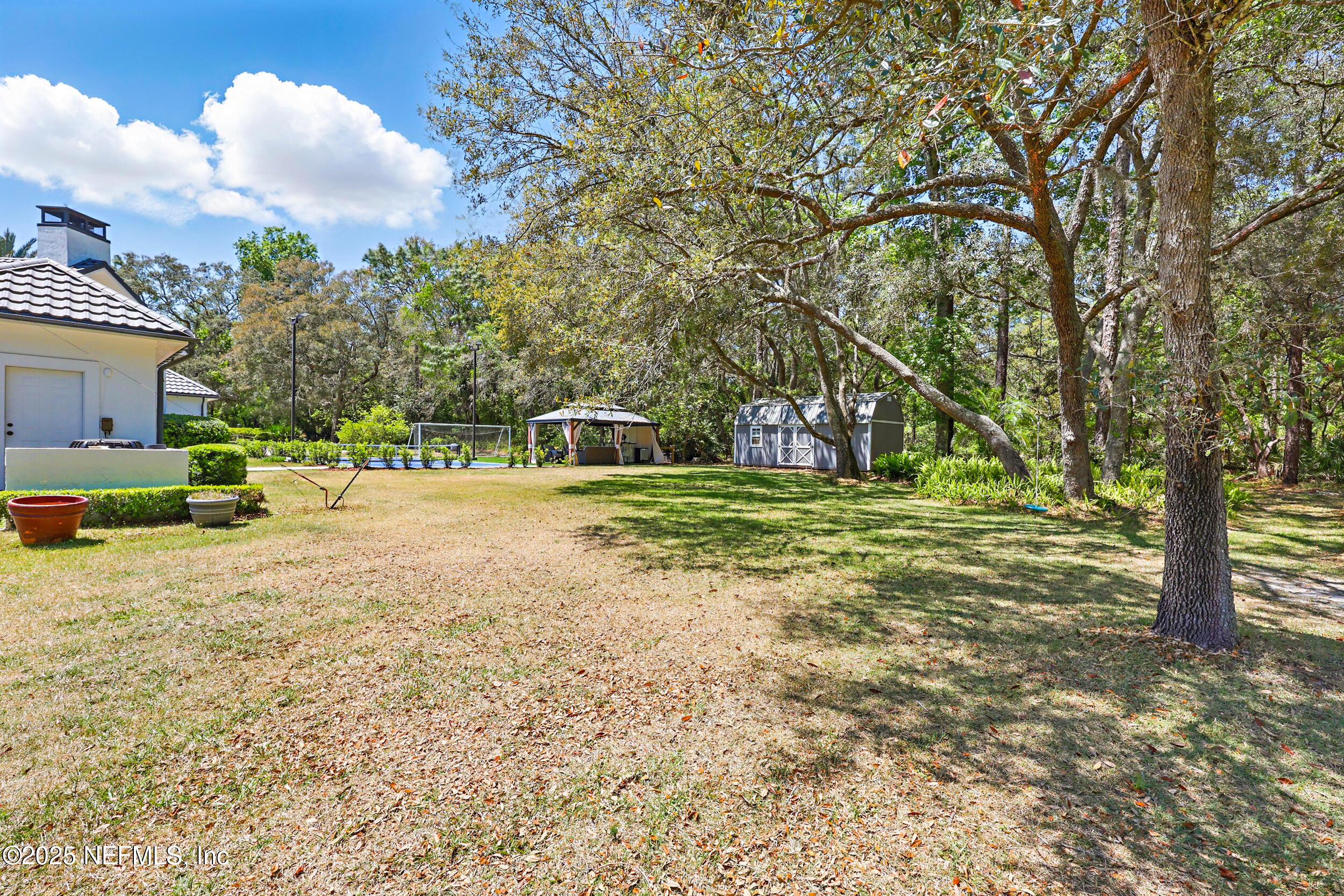 8007 Acorn Ridge Road Jacksonville, FL 32256 - Photo 63 of 76 a view of a park with large trees