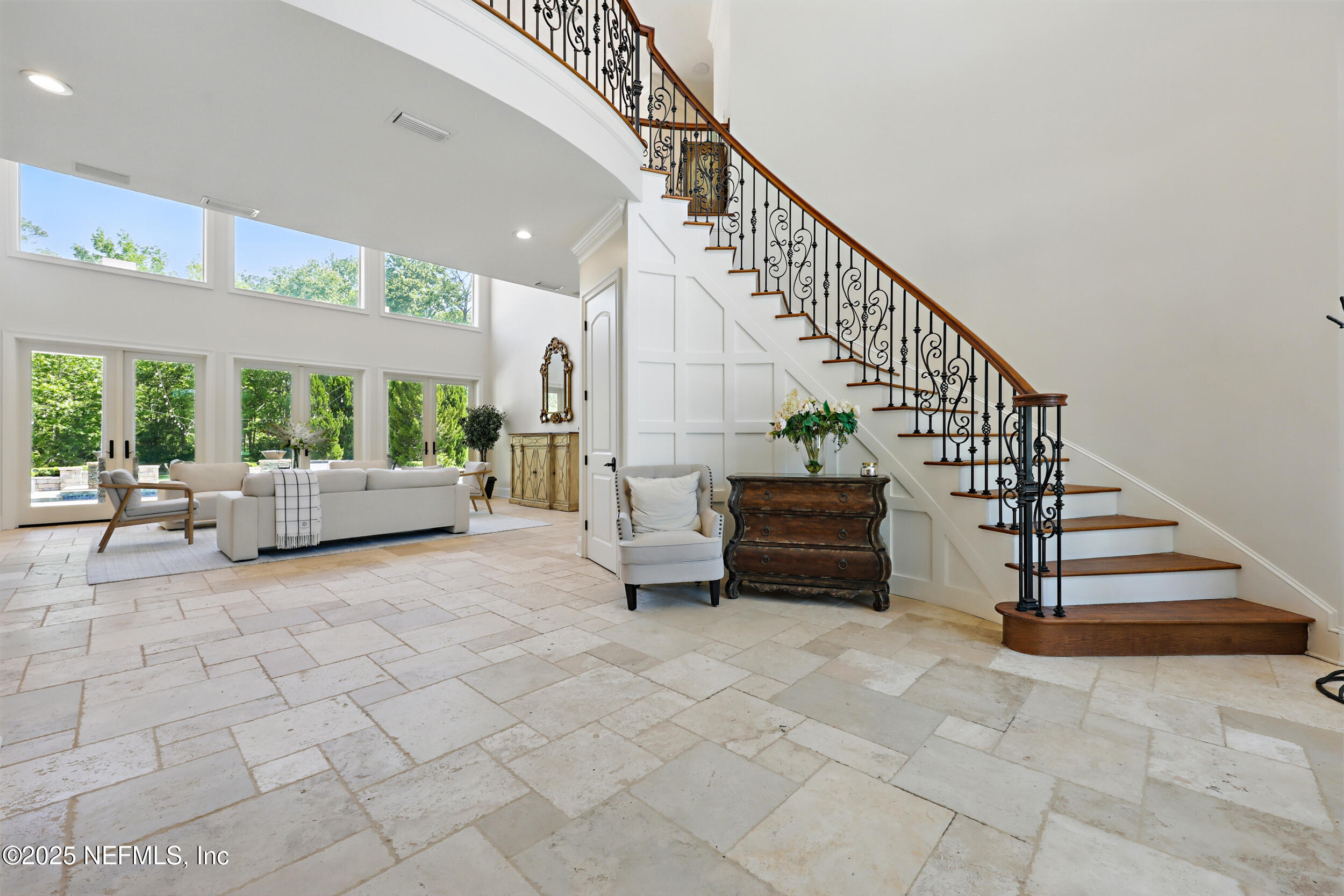 8007 Acorn Ridge Road Jacksonville, FL 32256 - Photo 8 of 76 a living room with furniture and stairs