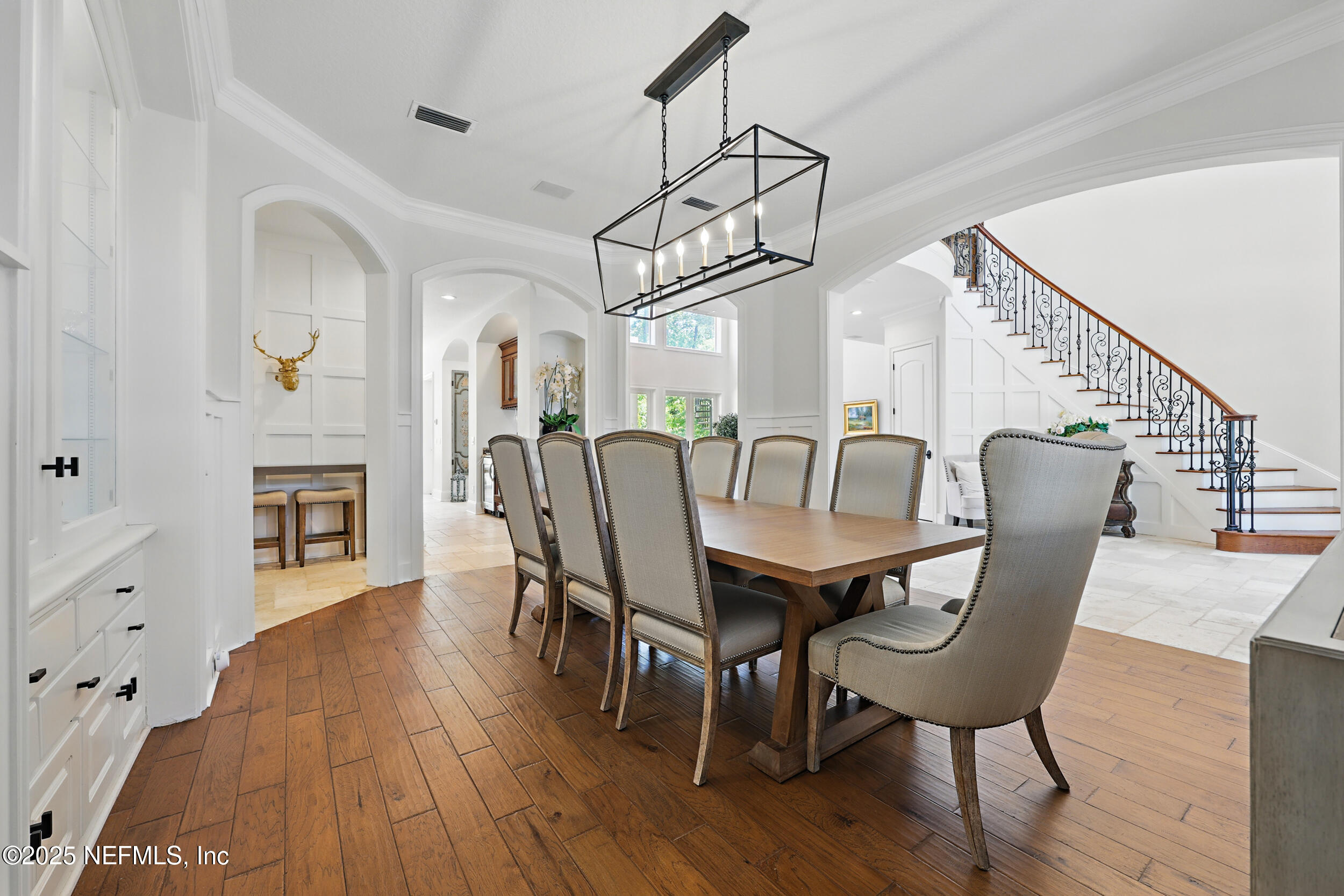 8007 Acorn Ridge Road Jacksonville, FL 32256 - Photo 10 of 76 a view of a dining room with furniture and wooden floor