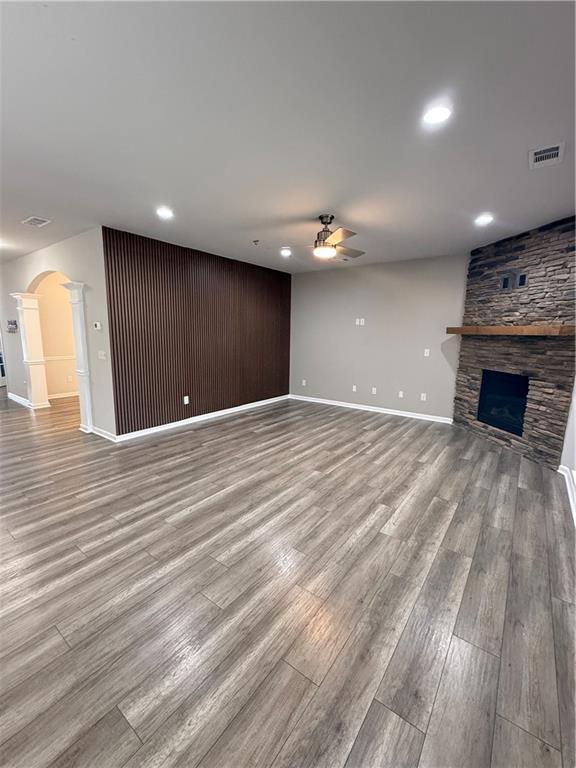 4610 Sandy Creek Drive Cumming, GA 30028 - Photo 13 of 49 a view of a livingroom with an empty space and a fireplace