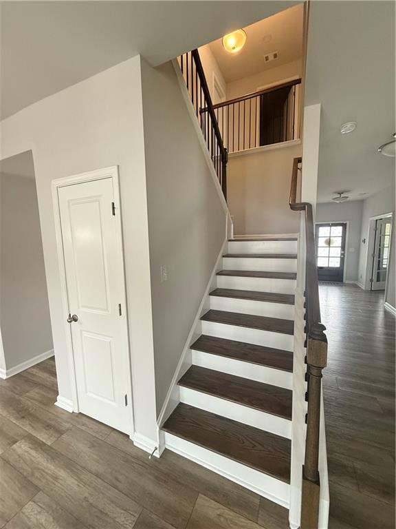 4610 Sandy Creek Drive Cumming, GA 30028 - Photo 21 of 49 a view of entryway with wooden floor and front door