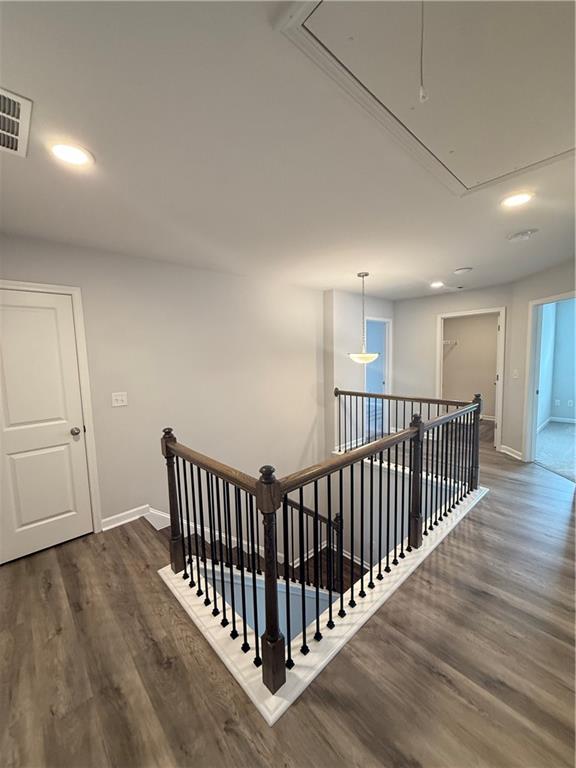 4610 Sandy Creek Drive Cumming, GA 30028 - Photo 34 of 49 a view of a hallway with wooden floor and windows