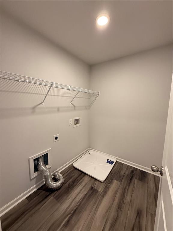 4610 Sandy Creek Drive Cumming, GA 30028 - Photo 43 of 49 a room with a wooden floor and white walls