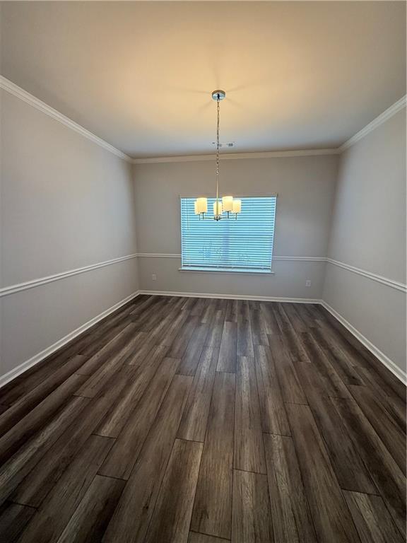 4610 Sandy Creek Drive Cumming, GA 30028 - Photo 9 of 49 a view of a room with wooden floor and windows