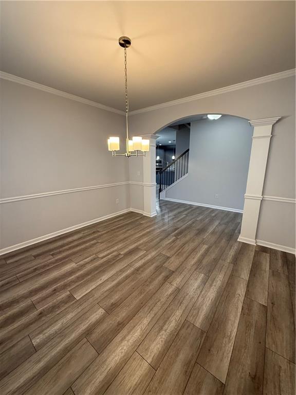 4610 Sandy Creek Drive Cumming, GA 30028 - Photo 10 of 49 a view of empty room with wooden floor