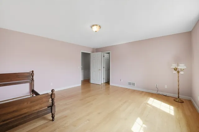 a kitchen with granite countertop a stove sink and cabinets