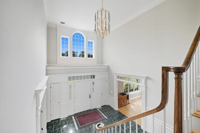 a view of living room with furniture and a window