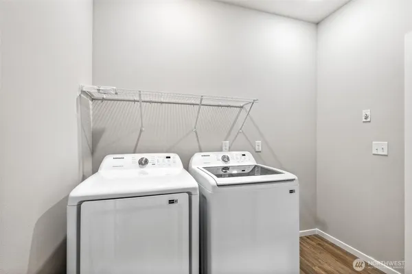 a utility room with dryer and washer