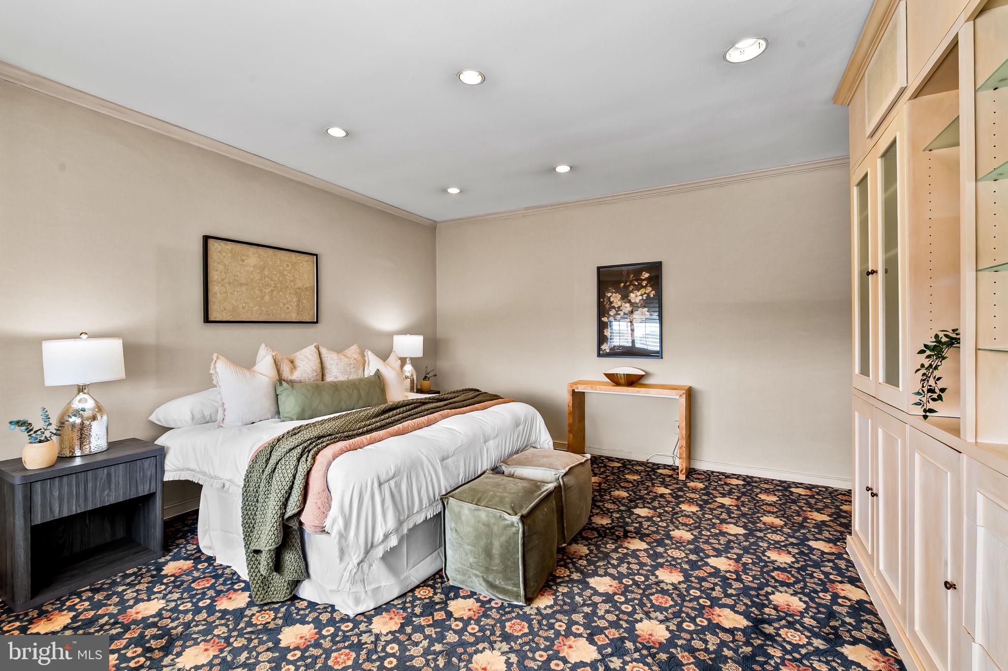 11 Slade Avenue, Unit 604 Baltimore, MD 21208 - Photo 28 of 36 a bedroom with bed and window