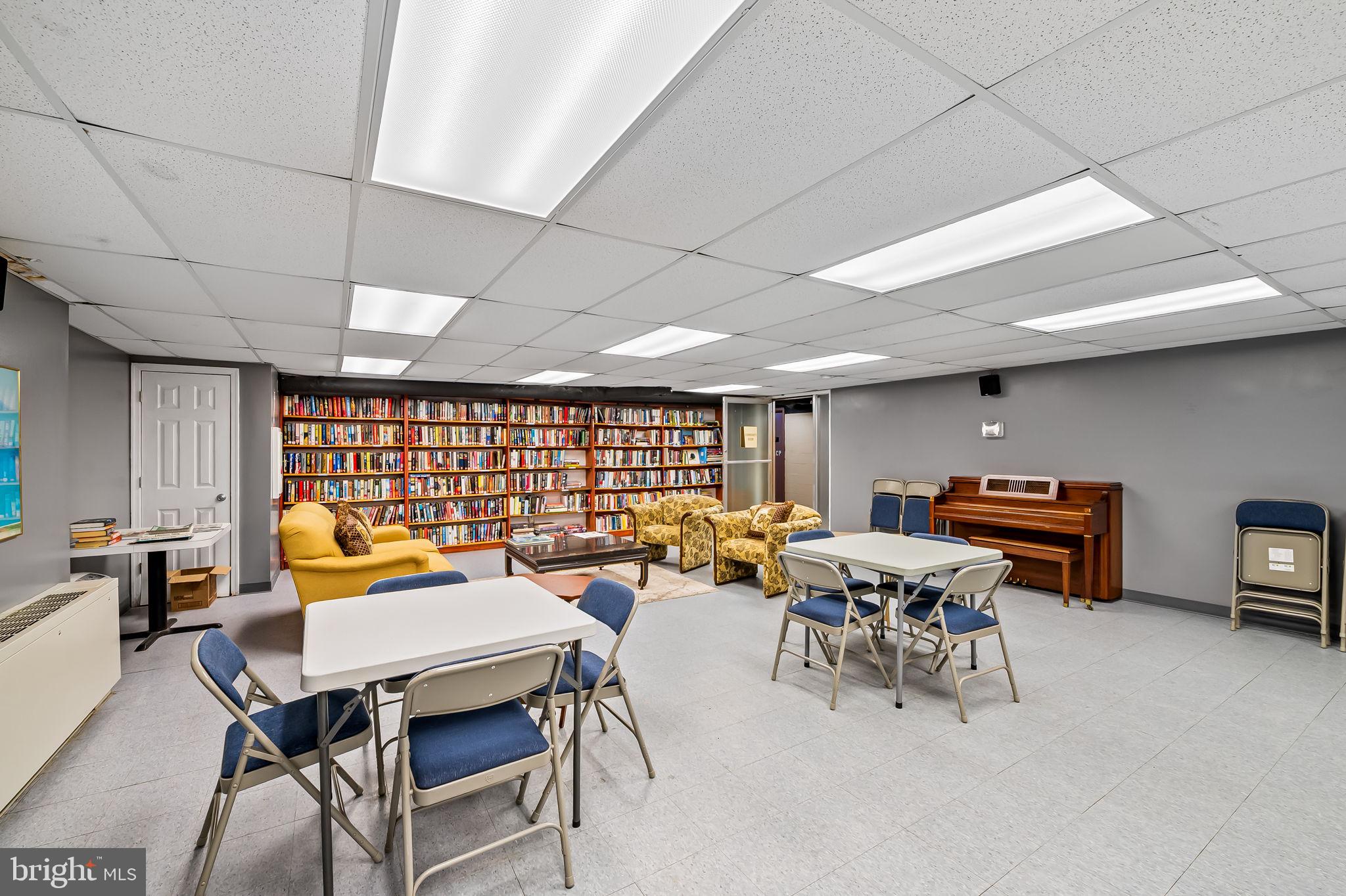 11 Slade Avenue, Unit 604 Baltimore, MD 21208 - Photo 35 of 36 a outdoor space with lots of furniture and a projector