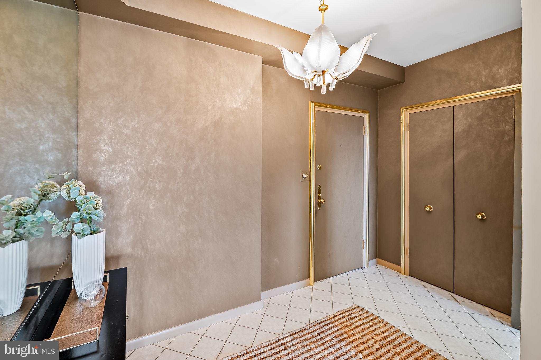 11 Slade Avenue, Unit 604 Baltimore, MD 21208 - Photo 5 of 36 a view of a chandelier in a room