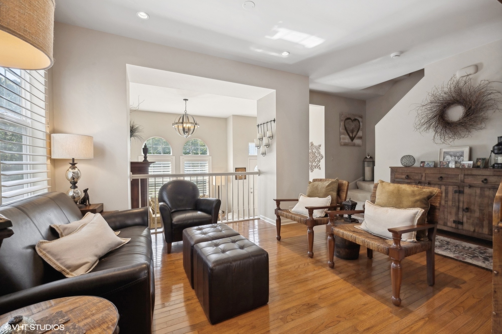 3834 North Milwaukee Avenue, Unit 11 Chicago, IL 60641 - Photo 11 of 46 a living room with furniture and wooden floor