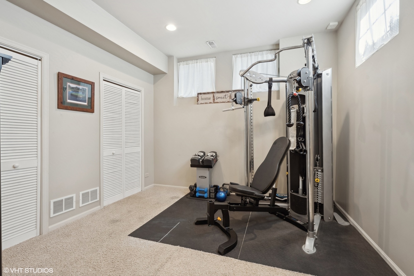 3834 North Milwaukee Avenue, Unit 11 Chicago, IL 60641 - Photo 23 of 46 a view of a room with gym equipment