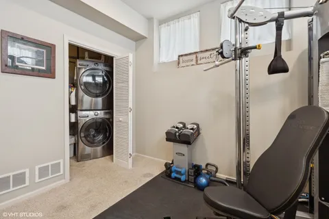 a bedroom with furniture and a wooden floor