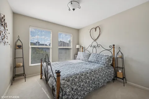 a bathroom with a sink toilet and a mirror