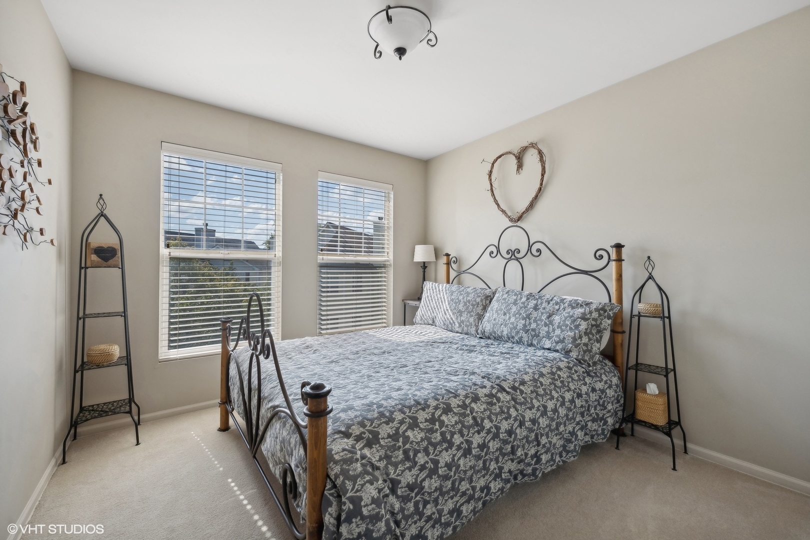 3834 North Milwaukee Avenue, Unit 11 Chicago, IL 60641 - Photo 30 of 46 a bedroom with a bed window and wall painting