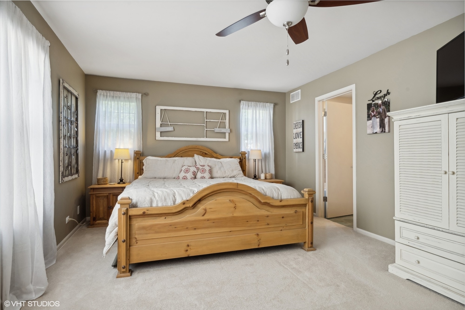 3834 North Milwaukee Avenue, Unit 11 Chicago, IL 60641 - Photo 35 of 46 a bedroom with a bed lamp and a window