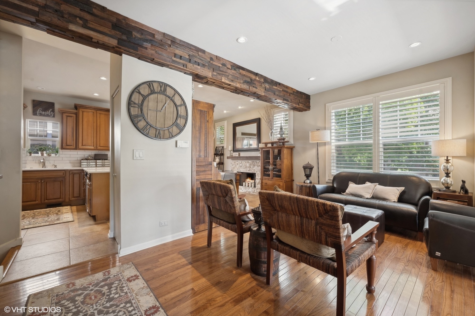 3834 North Milwaukee Avenue, Unit 11 Chicago, IL 60641 - Photo 8 of 46 a living room with furniture and a large window