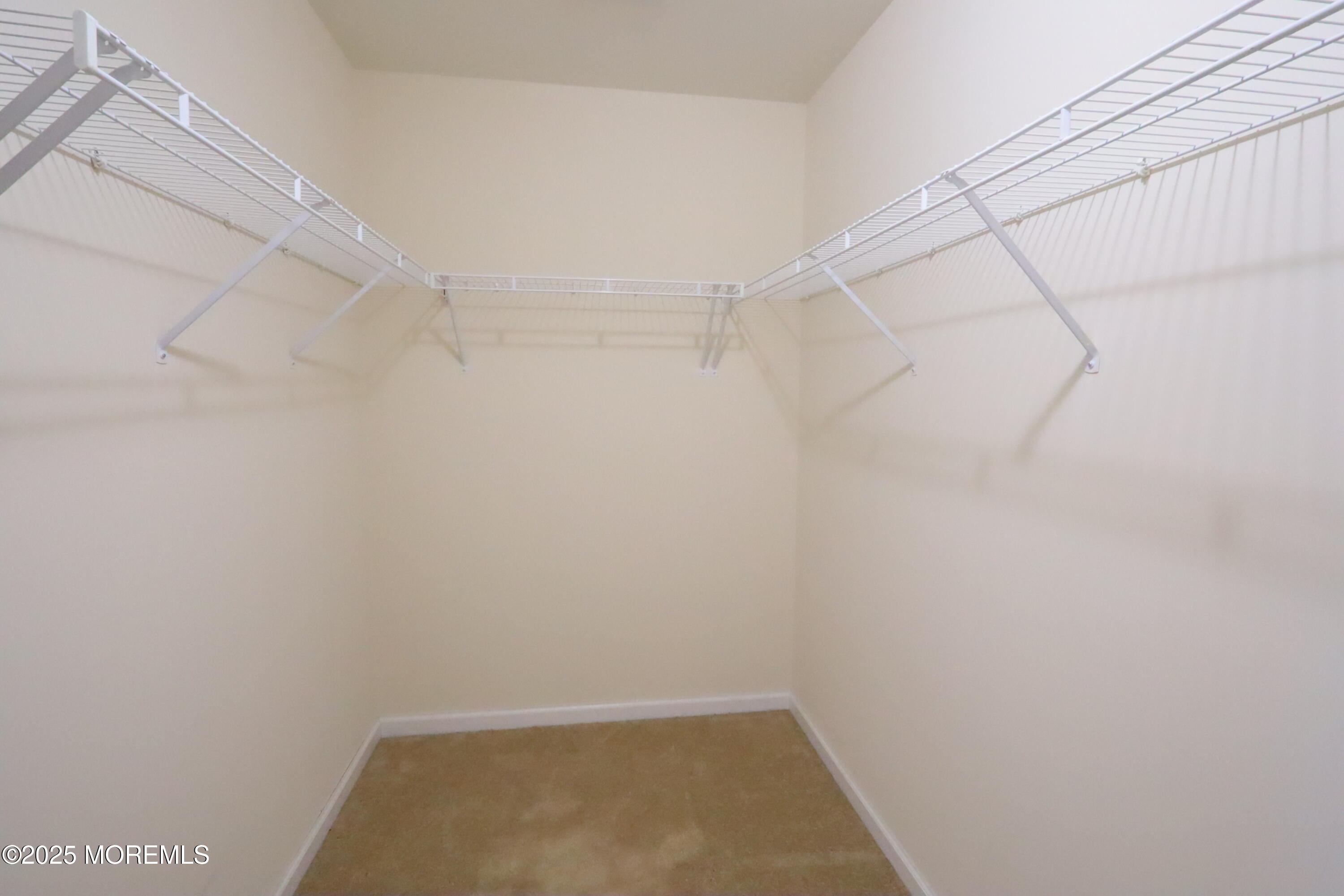 100 Pine Street, Unit 3 Lakehurst, NJ 08733 - Photo 16 of 20 a view of a room with racks on the wall
