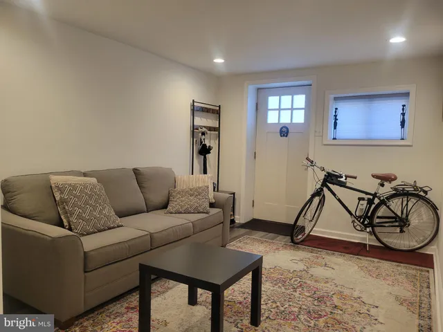 a living room with furniture and a couch