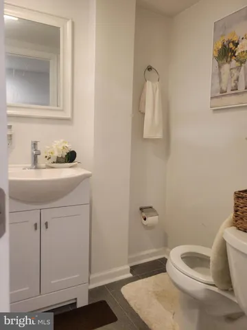 a bathroom with a sink and shower