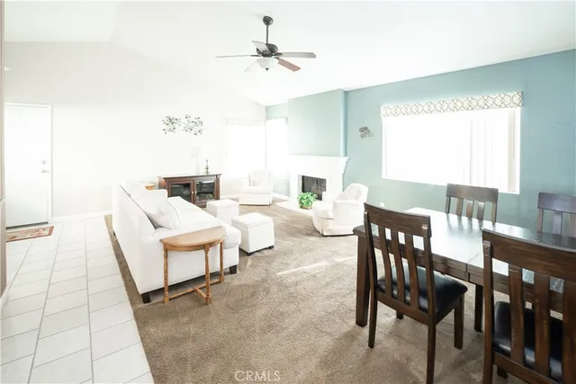 a view of a livingroom with furniture and window