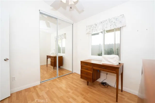 a room with a table and chairs