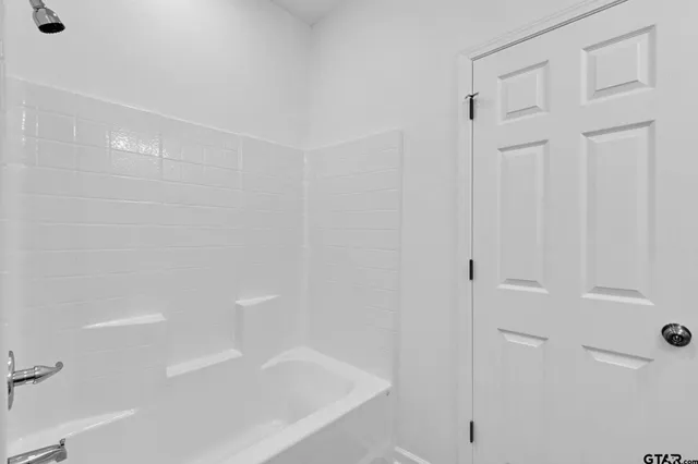 a bathroom with a bathtub