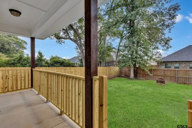 a view of a porch with a yard